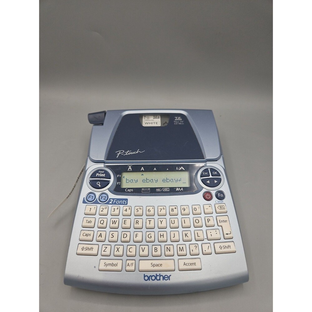 Brother P-Touch PT-1700 Label Maker Blue/Silver with TZ Tape White Tested